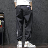 Dropshipping Autumn Men Streetwear Causal Striped Pants Mens Japanese Solid Loose Pants Male Baggy Sport Harem Pants